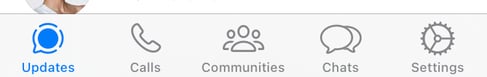Screenshot of tabs at the bottom of WhatsApp app on phone, with blue Updates tab
